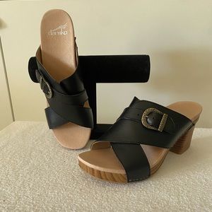 BNIB Dansko black leather platform clogs.